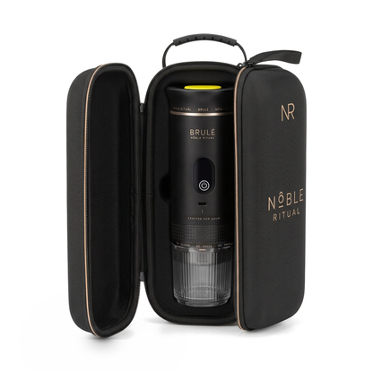 Noble Voyage espresso travel case, open, holding the Noble Brulé portable espresso maker, on a white background