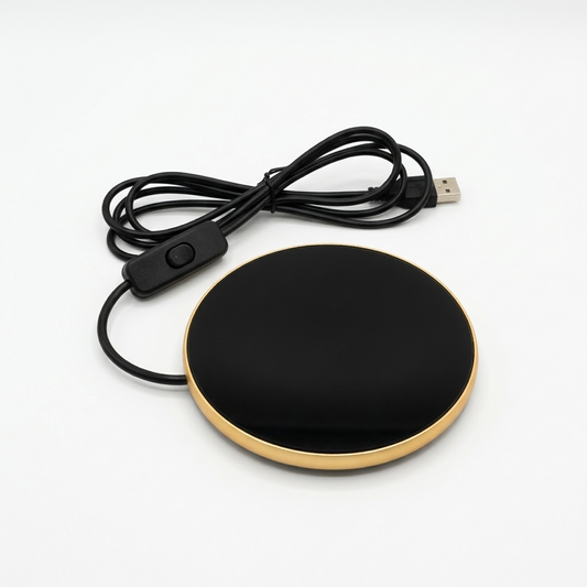 The Ritual Warming Plate, black glass top with gold rim, inline cable switch and USB cable