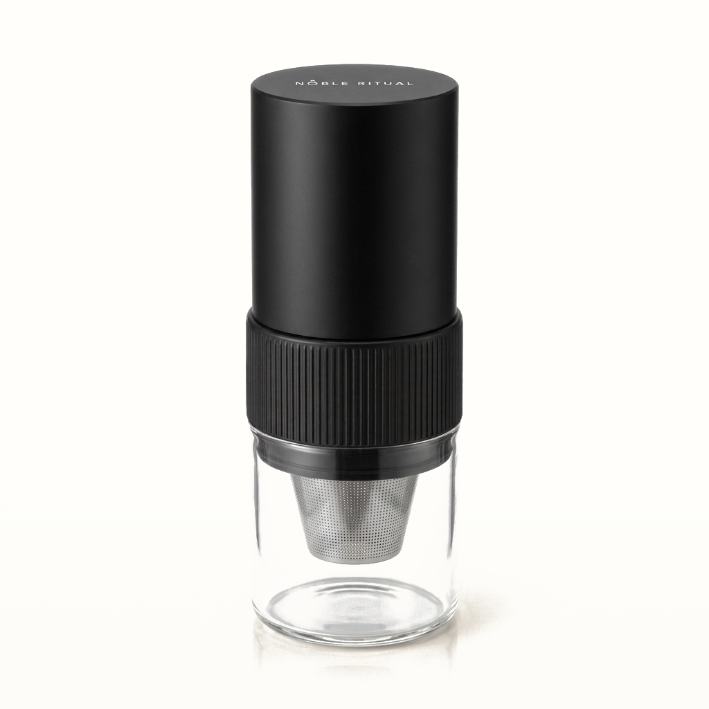 Noble Moulin portable electric coffee grinder with a glass catch cup