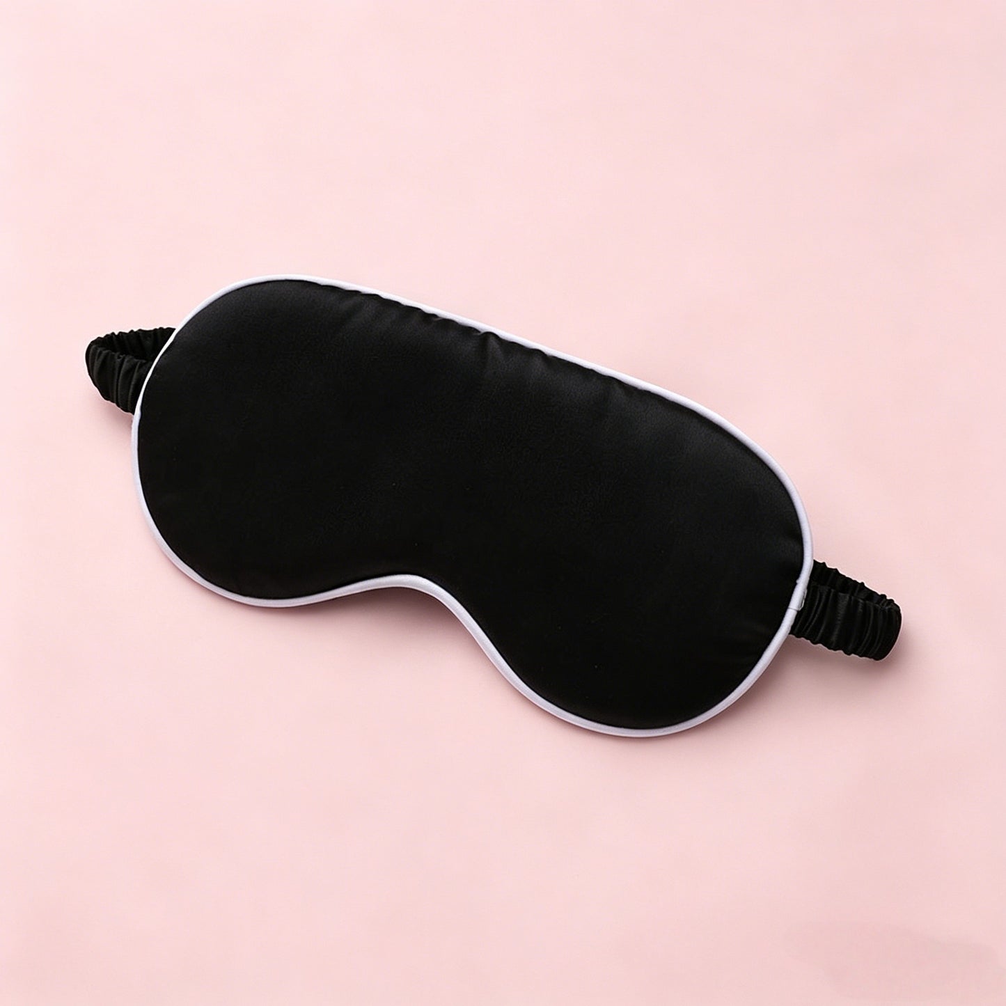 The Ritual Sleep Mask in black with white contrast trim, the only colorway we carry
