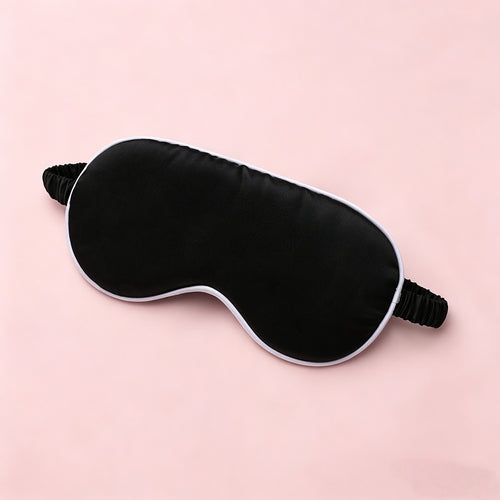 The Ritual Sleep Mask in black with white contrast trim, the only colorway we carry