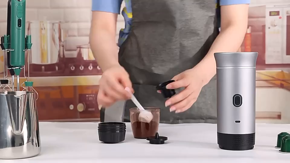 Ground coffee being added to the Brulé holder