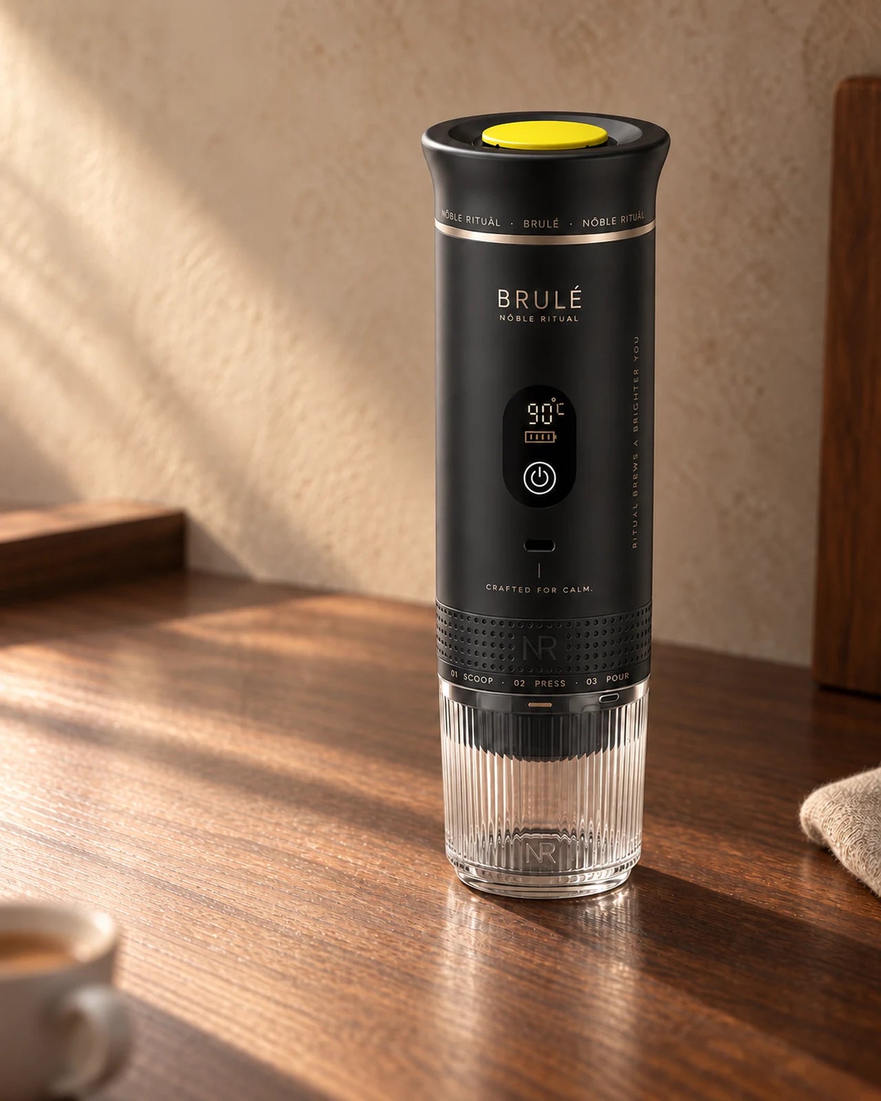Brulé portable espresso maker design concept, full device and cup
